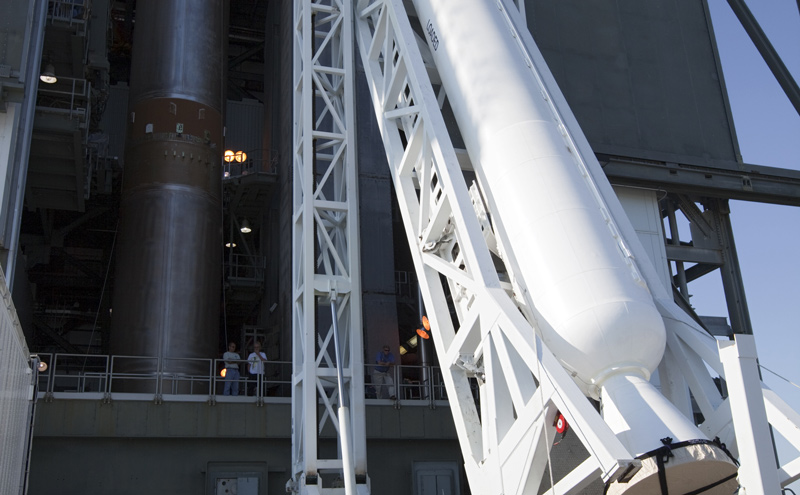 At the Vertical Integration Facility at Space Launch Complex 41 on Cape Canaveral Air Force Station in Florida, technicians use a lifting device to elevate a solid rocket motor (SRM) into an upright position for mating to a United Launch Alliance Atlas V rocket which will carry NASA's Mars Science Laboratory (MSL) mission.